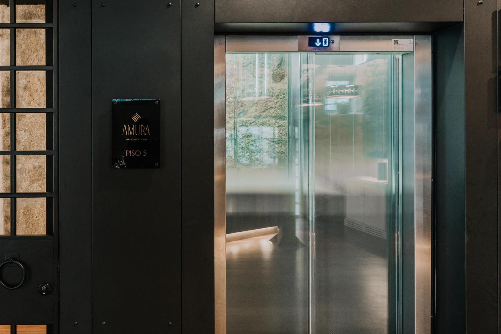 Hotel Timbre Virtudes à OOporto Extérieur photo A glass elevator